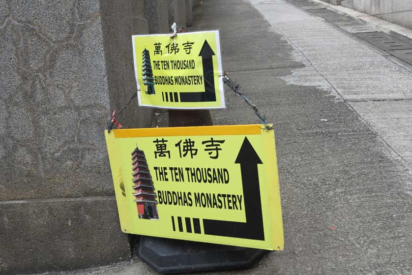 Sign to Ten Thousand Buddhas Temple, Sha Tin, Hong Kong.