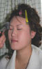 Chinese bride having make-up applied.