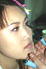 Chinese bride having make-up applied.