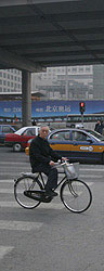 Beijing cyclist, Beijing, China.