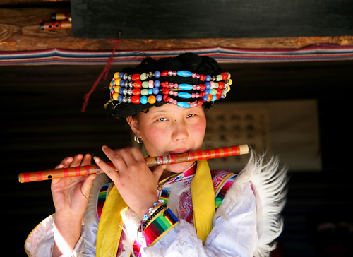 Lijiang woman, Yunnan Province, China.