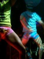 Gay guys dancing at a night club.