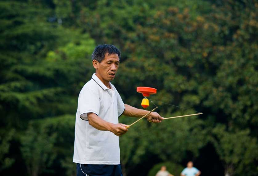 Spinning Tops, Green Lake Park, Kunming, China.