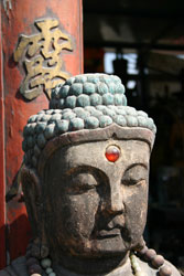 Buddha head at Beijing Kite Market.