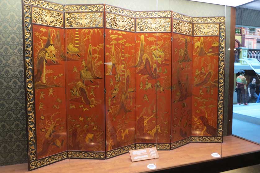 A large Chinese folding screen.