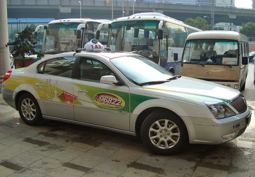 Taxi outside a hotel.